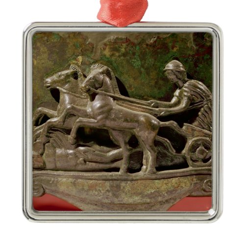 Charioteer in his chariot, detail from a cist metal ornament